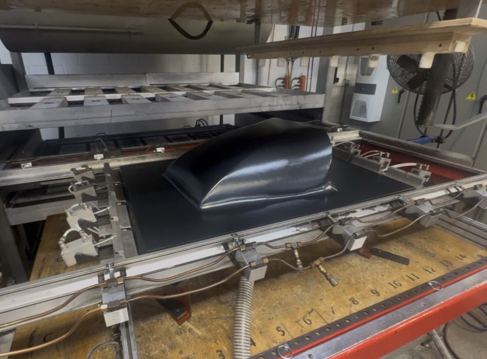 In-process photo of the nose panel actively being formed.
