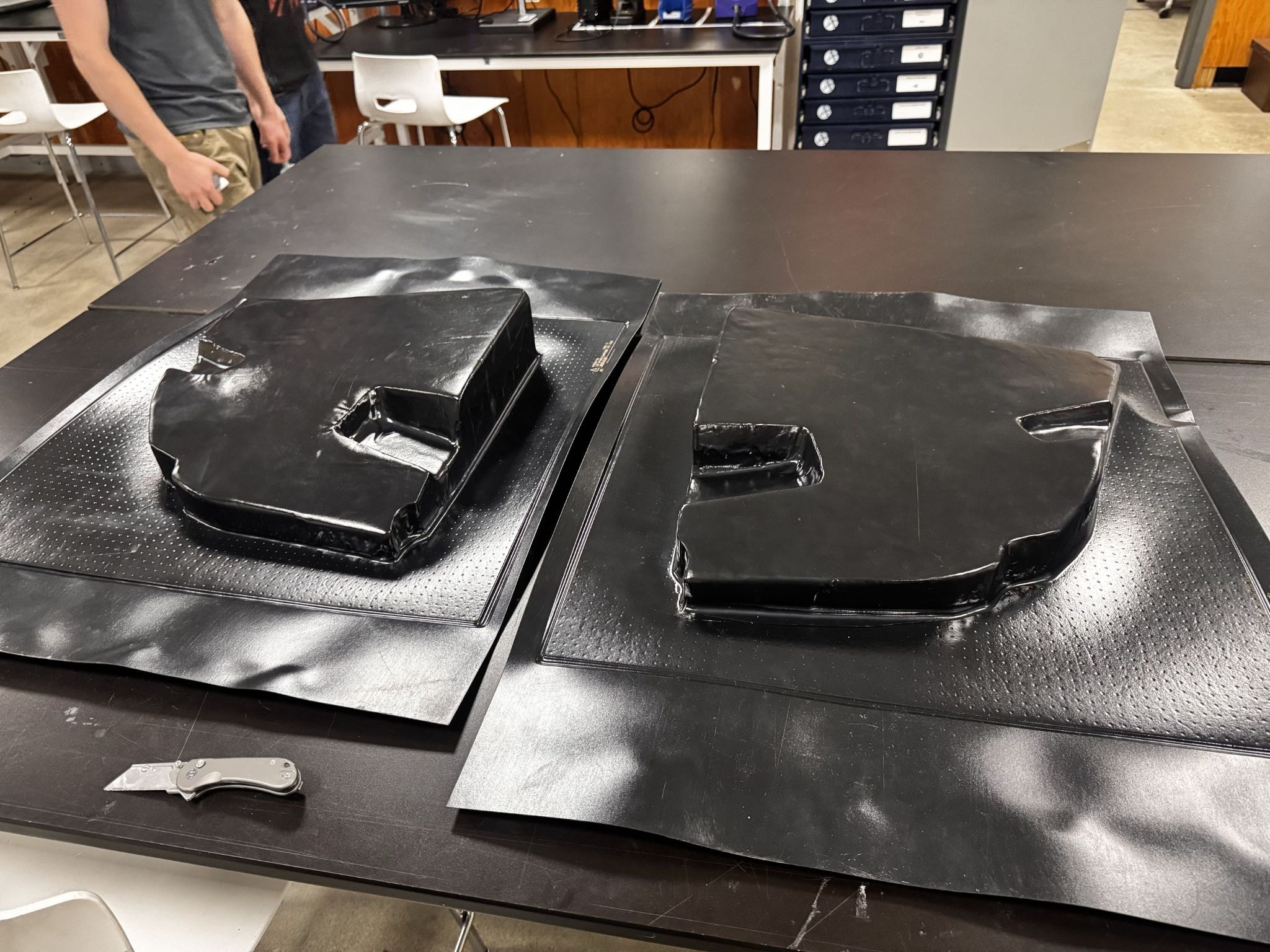 Side panels fresh off the vacuum former.